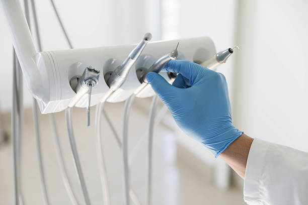 Professional Tooth Extraction technician working in Santa Anna, TX